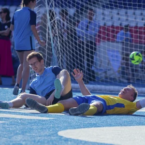 Reportage photo pour documenter le dérouler d'un match de football caritatif
